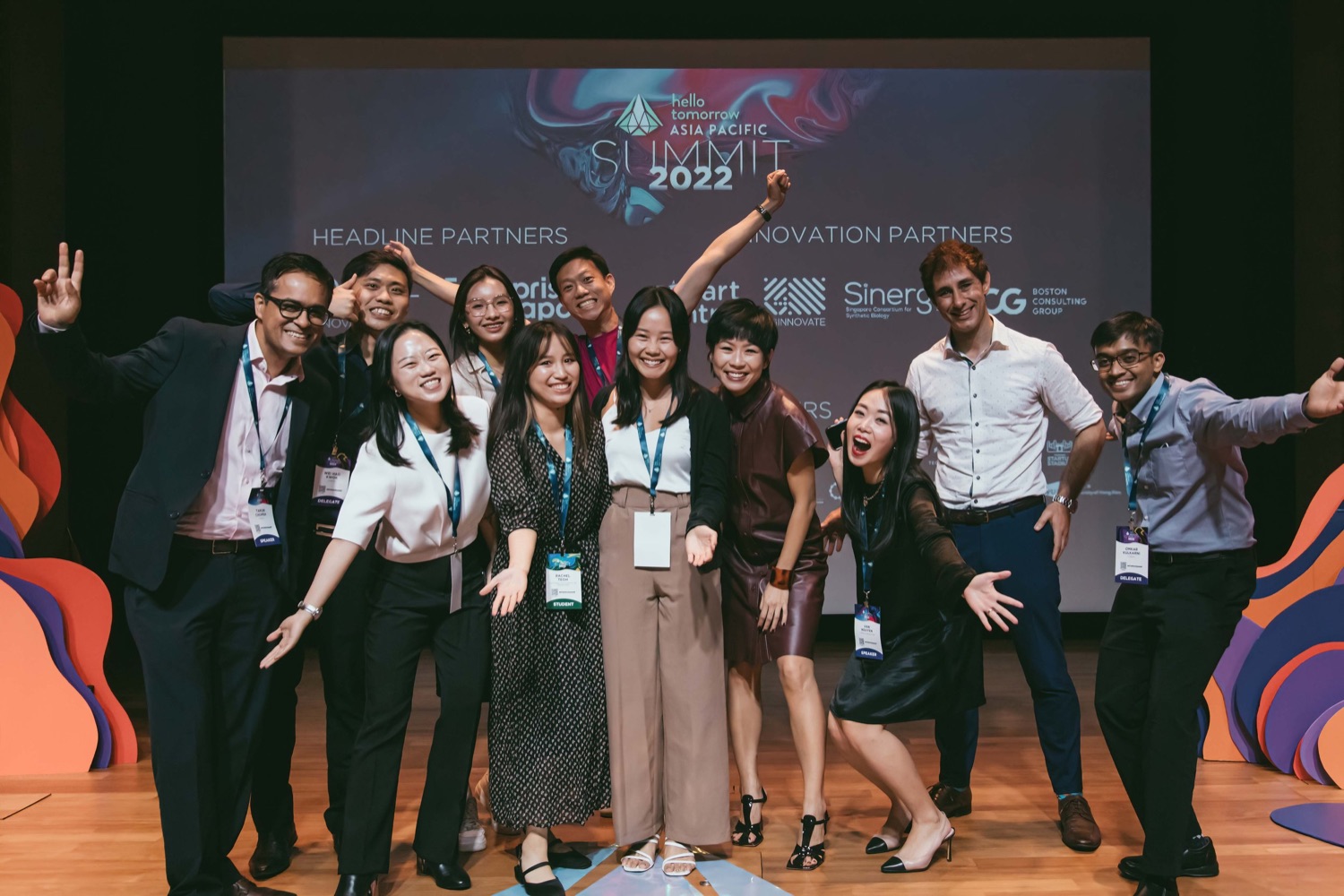 Team photo on stage at a company event