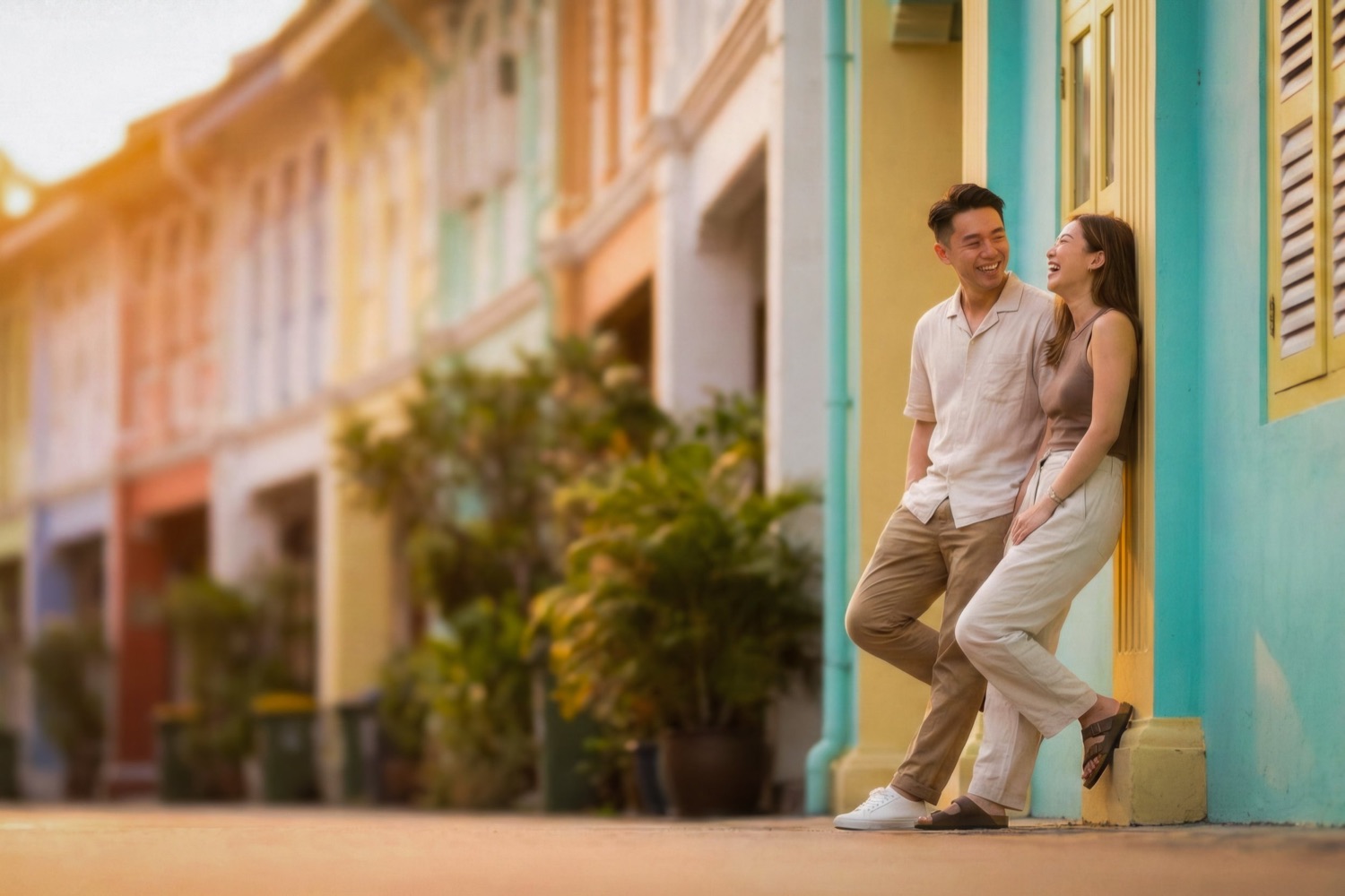 Couple on a colourful shophouse street