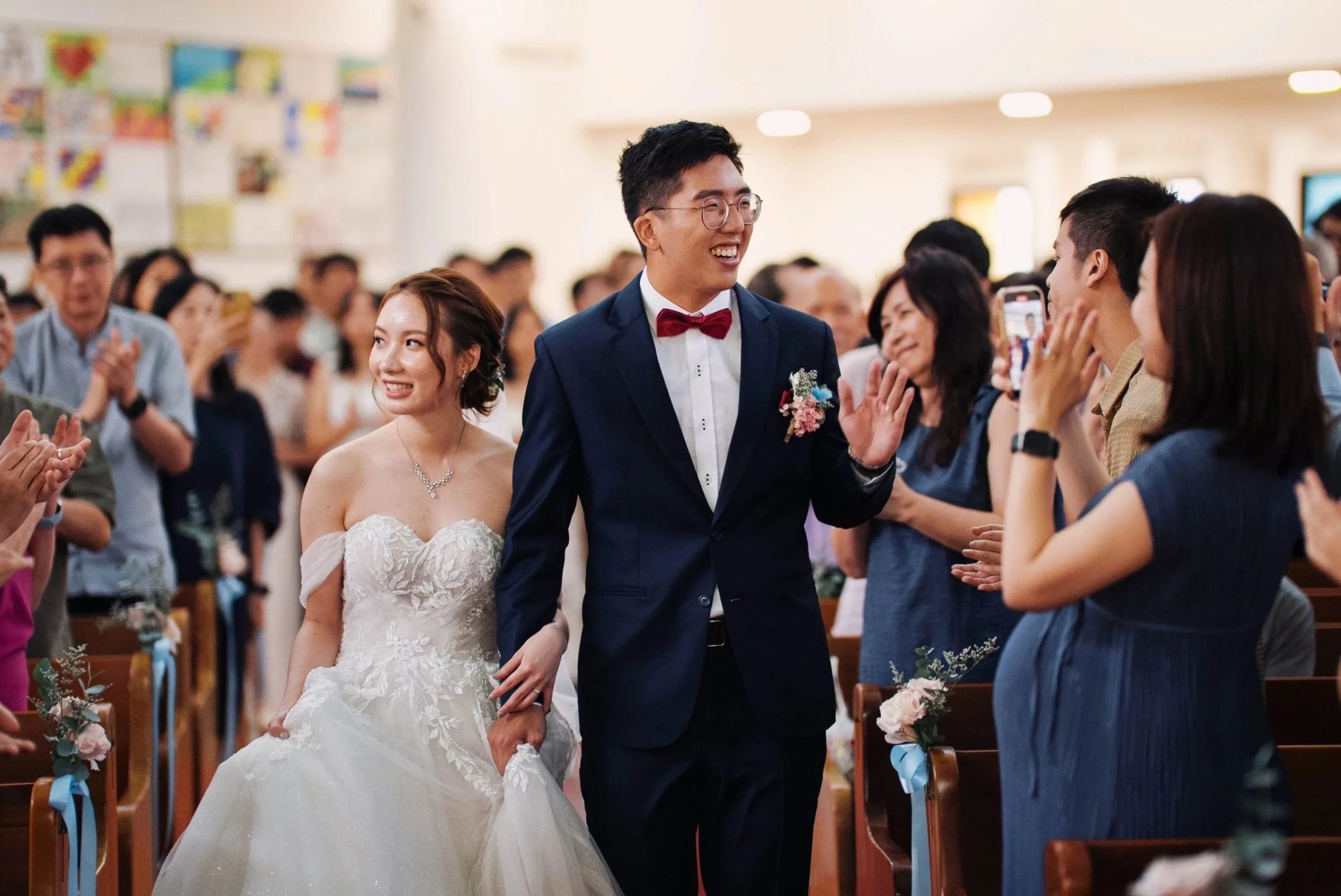Bride and groom with their guests after the ceremony
